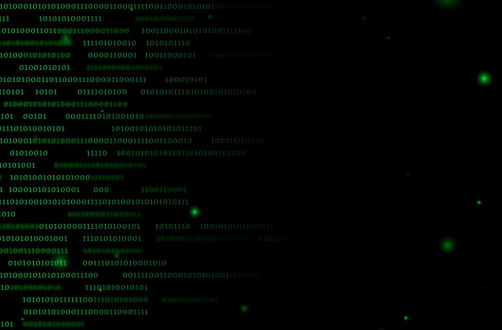 A stream of green binary code on a black background, symbolizing digital data